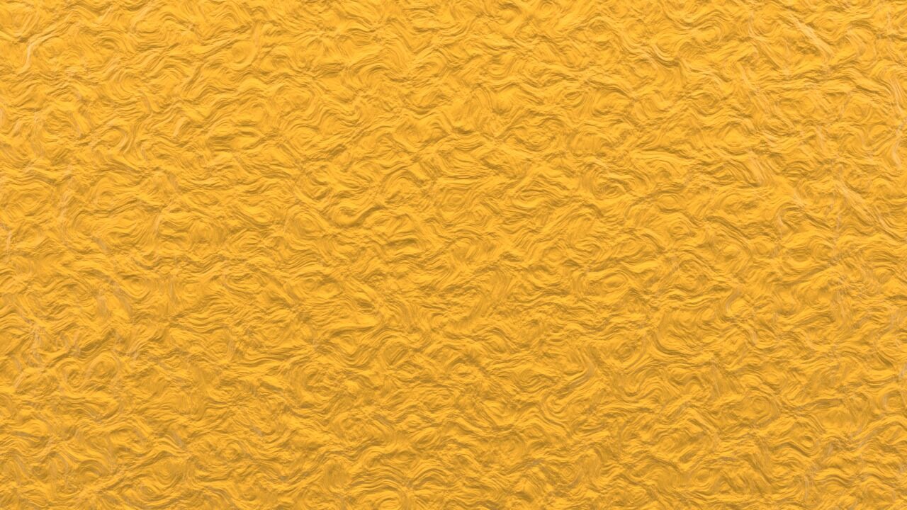 Gold thread shimmer — a decorative textile texture